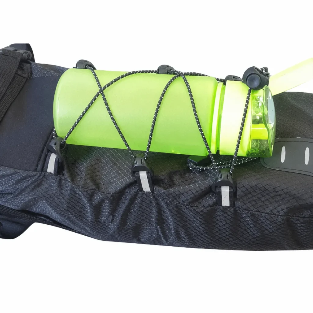 image showing a water bottle held in place with saddle bags cargo net