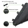 Black cycling frame bag showing zipper detail, dual zip pulls and adjustable strap trim guid