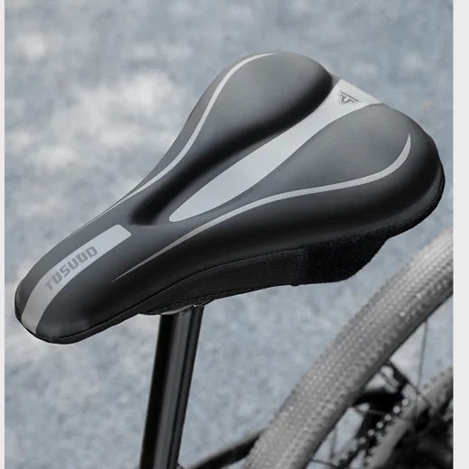Black gel bike seat cover fitted to a bicycle saddle for extra padding and riding comfort