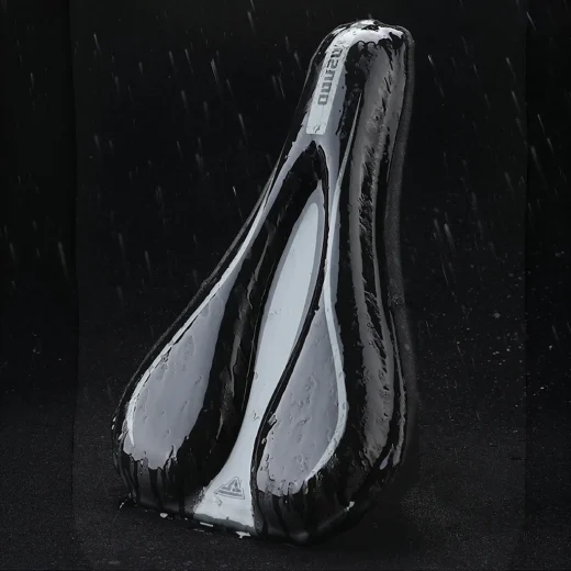Black gel bike seat cover with water beading on the surface to show the outer finish