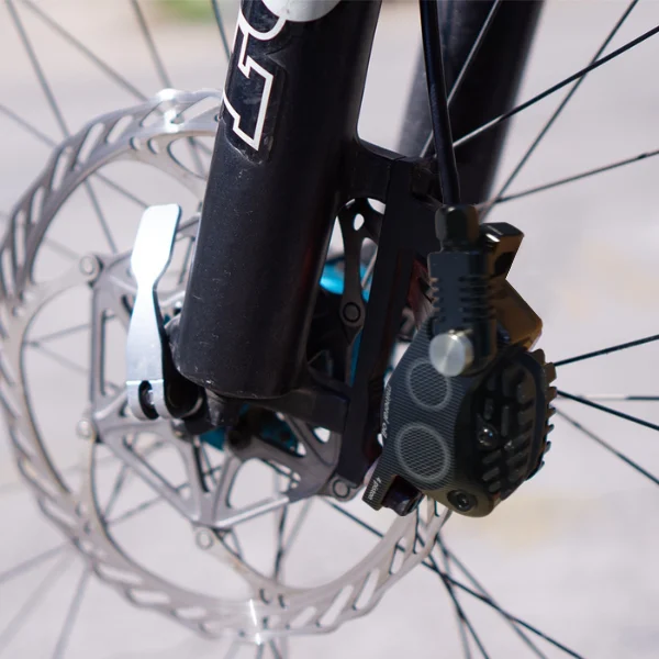 Black hydraulic caliper on bike