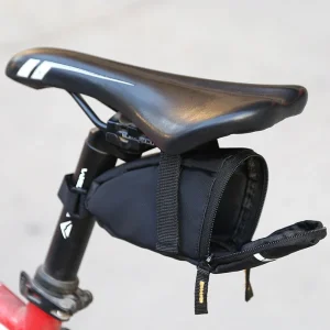 small sadlle bag opened on back of a bike