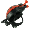 angled shot of red ladybug childrens bike bell