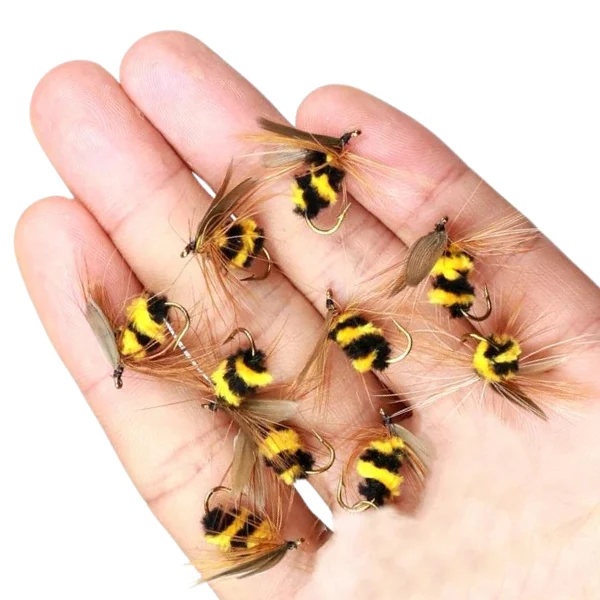 10 bee fishing flies held in hand