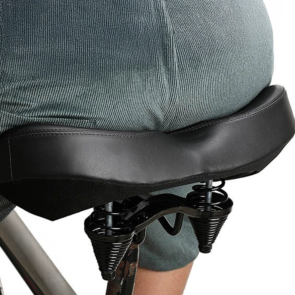 person using the extra wide bike saddle from adsports nz