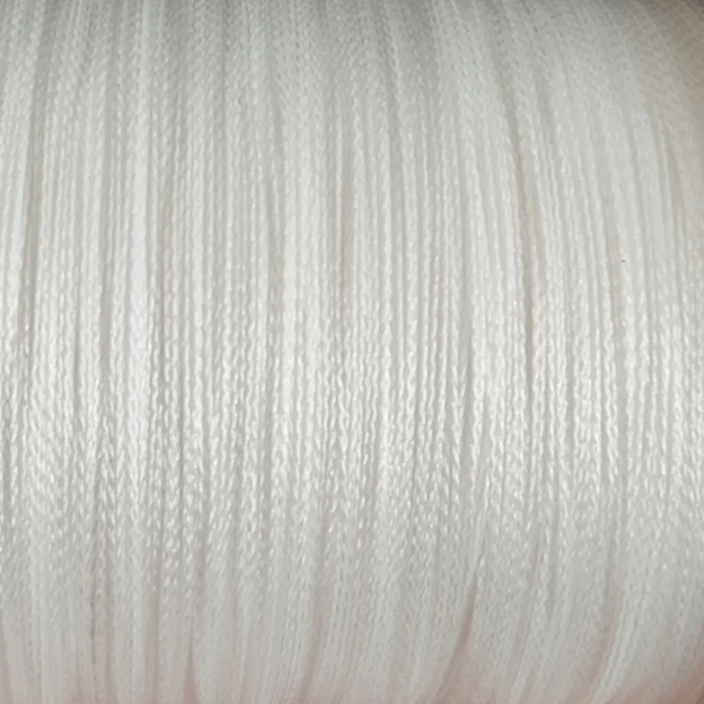 Close-up of white braided fishing line texture showing 4-strand weave