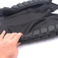 Folded padded shorts showing side EVA thigh and hip pads with mesh panels