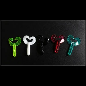 Assorted dual curly tail soft bait grubs in green, white, black, red and blue colours