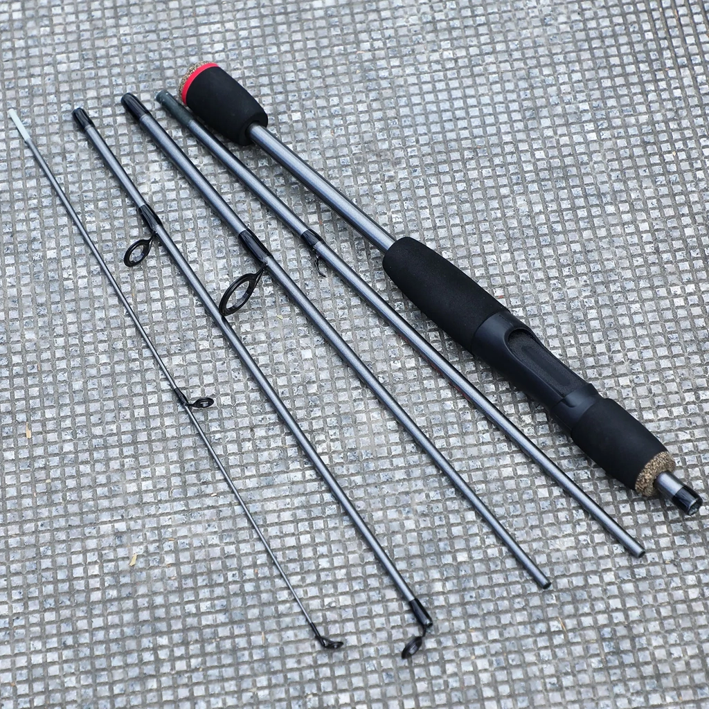 Five-section portable spinning rod laid out with handle, rod sections and guide tip.