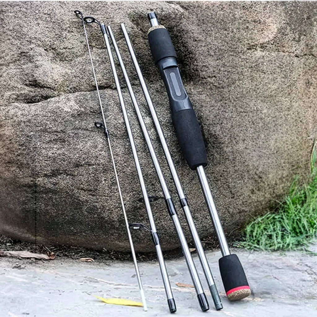Portable five-section spinning rod placed beside a rock for outdoor fishing use