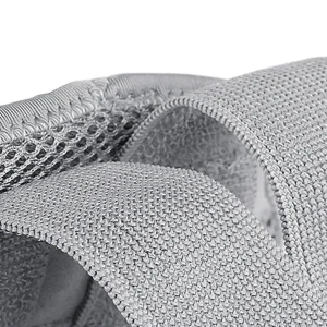 Close-up of grey wrist splint breathable mesh fabric and adjustable strap material