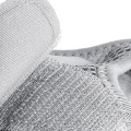 Close-up of grey wrist splint hook-and-loop fastening material and stitched fabric edge