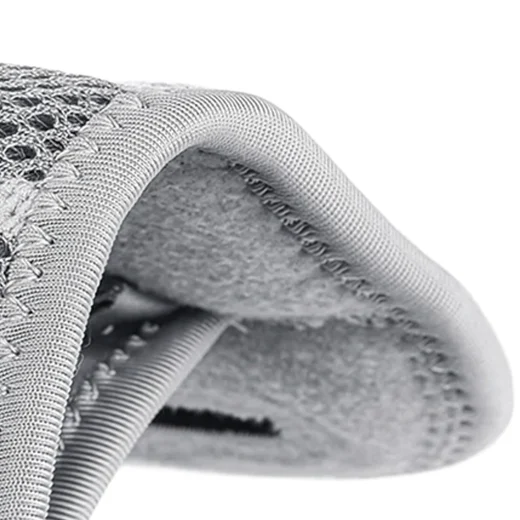 Close-up of grey wrist splint inner padding and stitched fabric edge