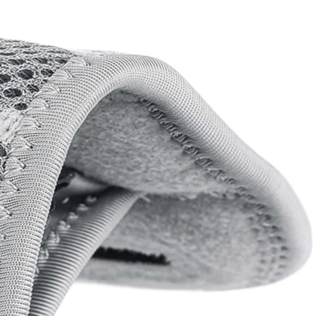 Close-up of grey wrist splint inner padding and stitched fabric edge