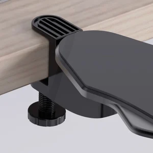 Close-up of the screw clamp fitting on a black desk arm rest attached to a desk edge