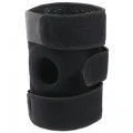 Black adjustable open patella knee brace shown rolled upright with side strap detail