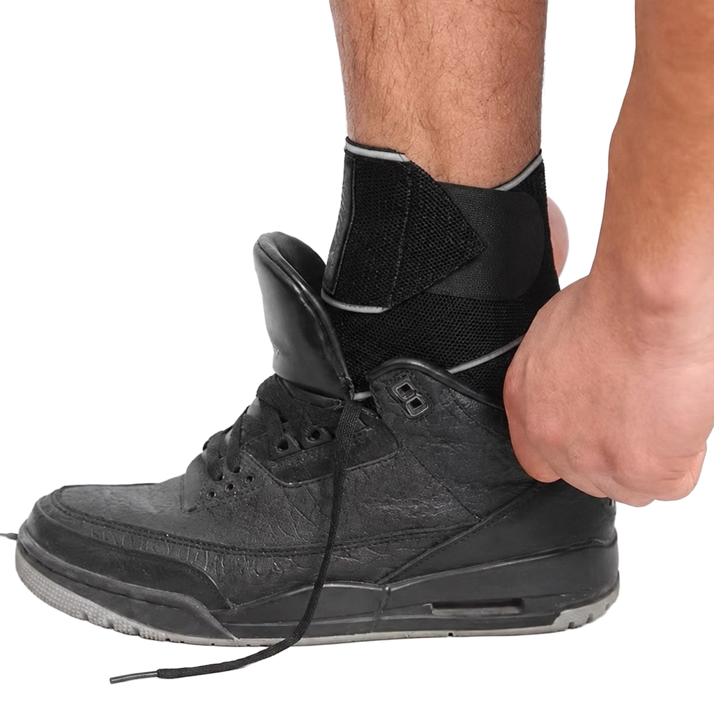 Black and grey ankle strap worn above a black shoe to show shoe-friendly fit