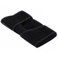 Black knee support brace laid flat showing the wraparound shape and Velcro strap areas
