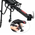Close up of pannier rack seat tube clamp and mounting point near the bike saddle