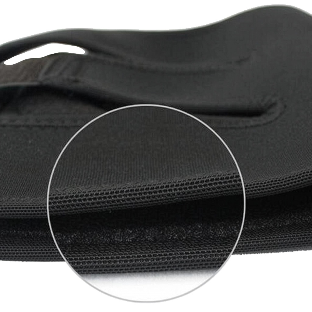 Close-up of the black knee support brace fabric and stitched edge detail