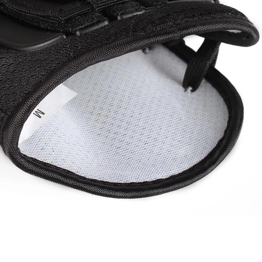 Close-up of the inside padding and size M label on the ankle strap support brace