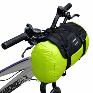 Green bike handlebar bag mounted on bike handlebars side angle view