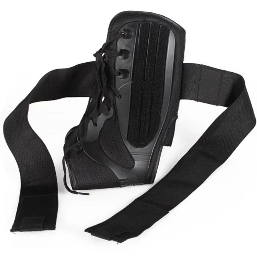 Side view of black ankle strap support brace with long adjustable straps and lace fastening