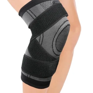 Side view of the knee sleeve showing black straps over the grey breathable sleeve body