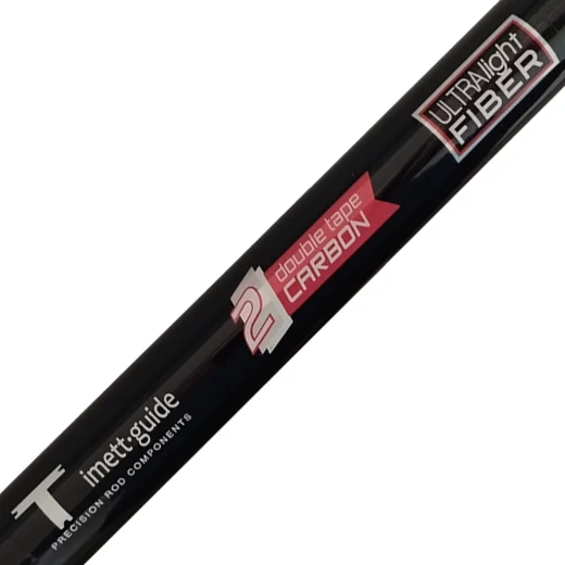 Close-up of black surfcasting rod showing double tape carbon and ultralight fibre labels