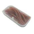 Translucent closed box holding a pack of brown earthworm fishing lures