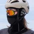 Balaclava mask worn with a cycling helmet and sports glasses