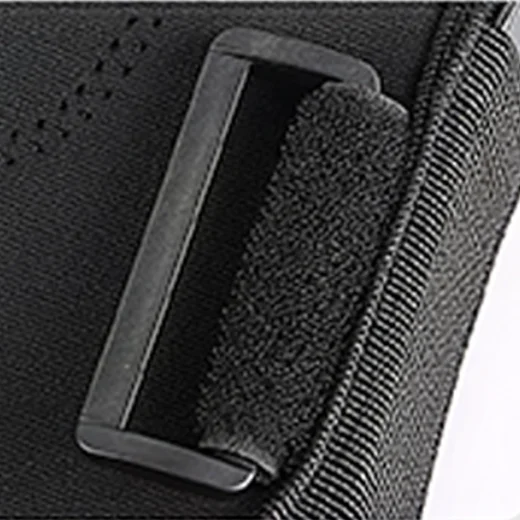 Close-up of the black strap guide buckle on the hinged knee brace