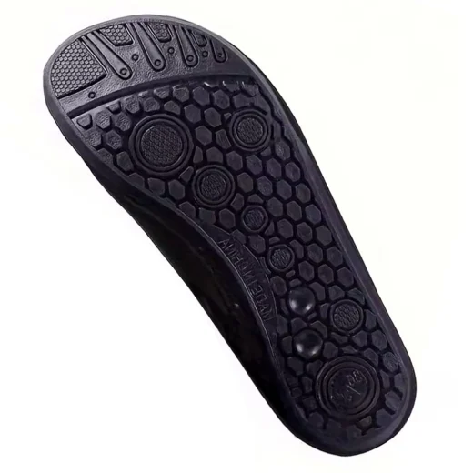 Close-up of the patterned black TPR sole on a water shoe