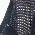 Close view of the textured mesh-knit mouth panel on the balaclava mask