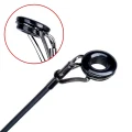 Close-up of the PHISHGER surfcasting rod tip guide and guide insert