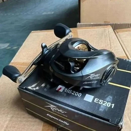 Angled view of black baitcasting reel showing the spool opening and side cover